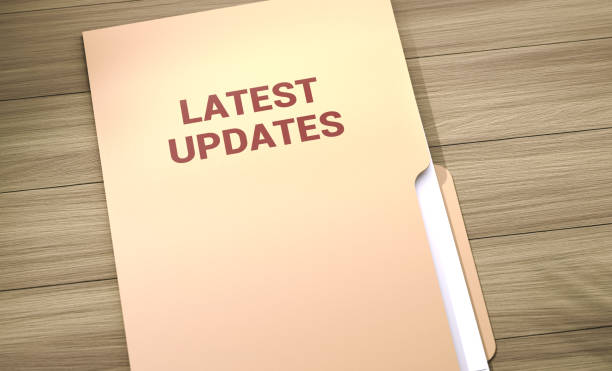 Latest Update File Folder On Wood Table Latest Update File Folder On Wood Table